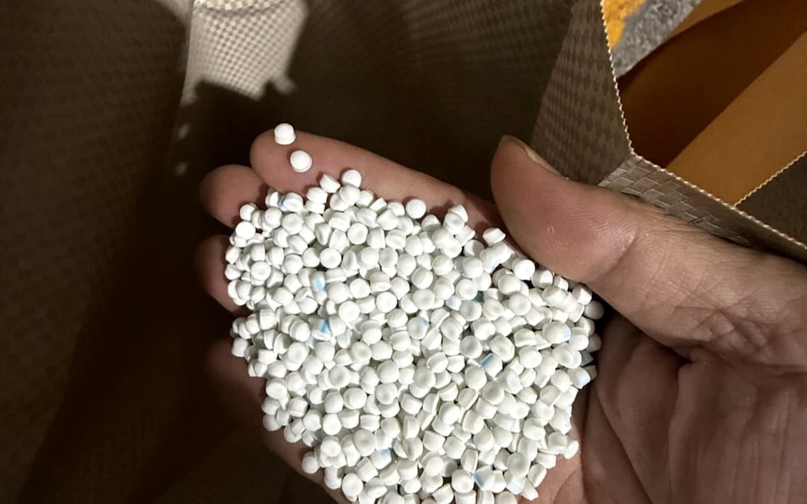 White cable compound pellet sample for material evaluation