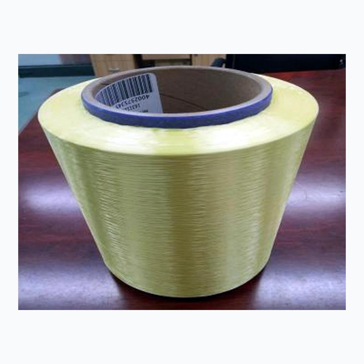 Yellow aramid yarn spool for cable reinforcement